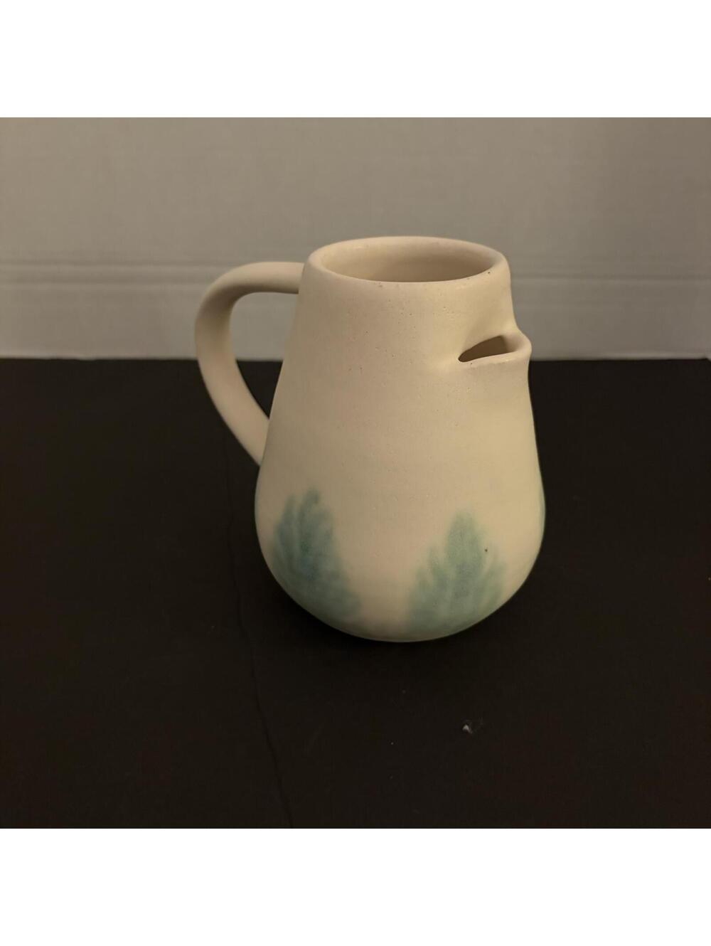 Signed & dated studio pottery pitcher with stylized pine trees, marked LJB 12/92